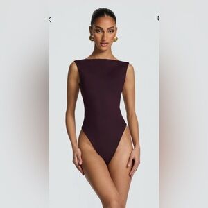 Brand new BABYBOO Tori Bodysuit in plum size small never worn